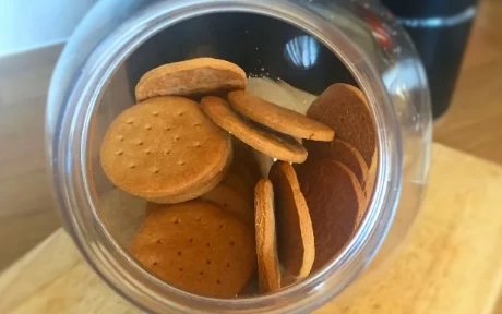 Digestive biscuits in a biscuit barrel